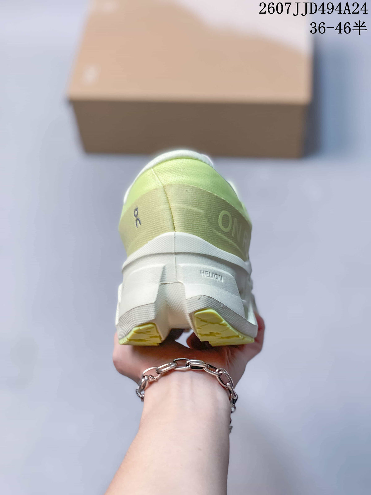 Rear view of the lime green and white sneaker showing the padded heel and outsole structure.