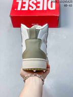 Rear view showing the heel and olive-tone panel