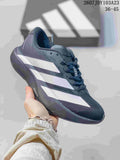 Dark adidas Adizero low-top sneaker with light reflective-style side stripes and a black sole.