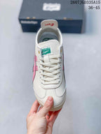 Top view showing the white laces, branded tongue label, and rounded toe shape.
