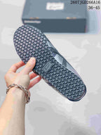 Underside view of the sneaker showing the textured rubber outsole.