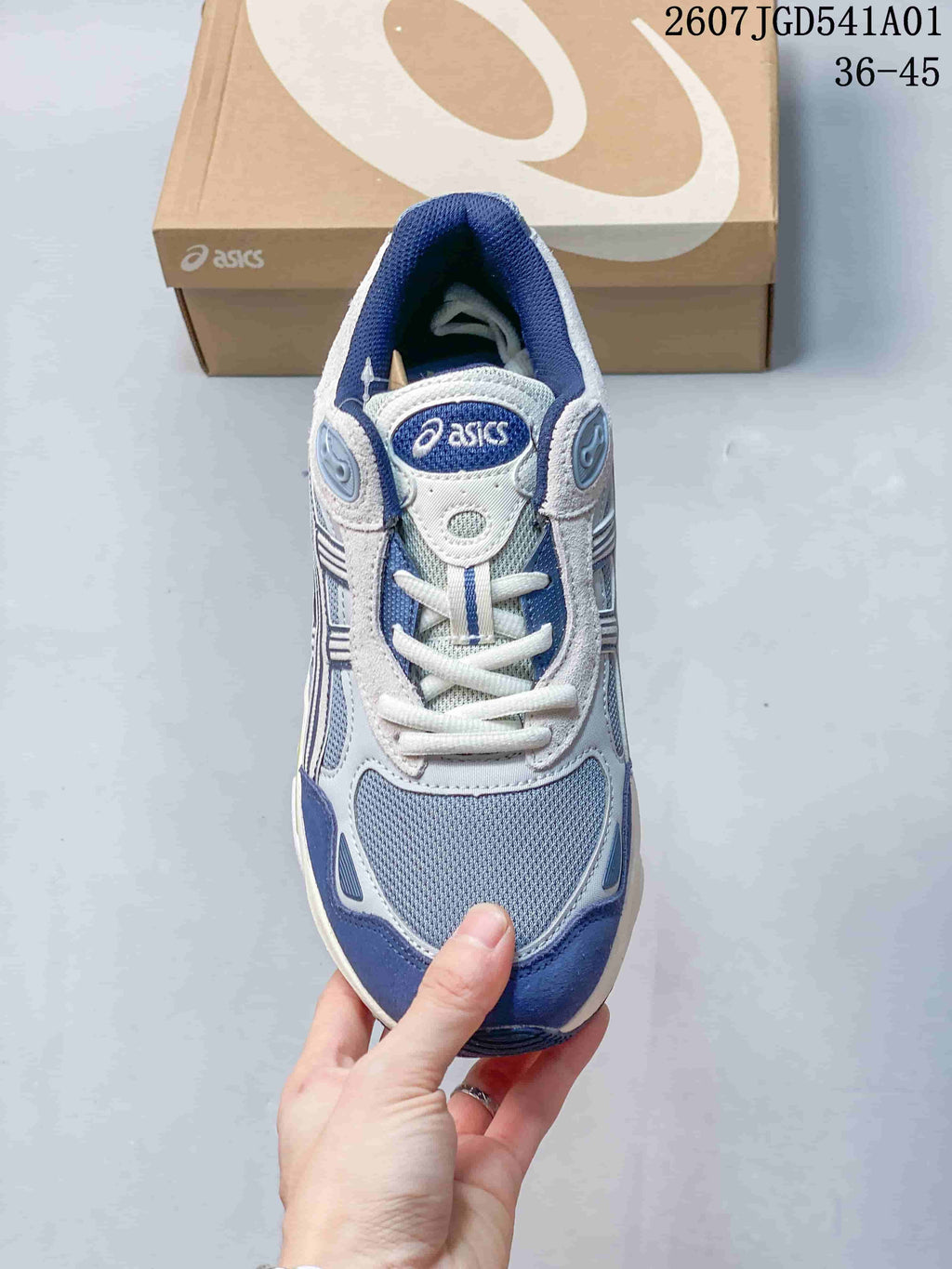 Top view of the sneaker showing the mesh toe, laces, and padded collar