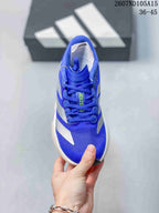 Top view of the blue lace-up sneaker with Adizero branding on the tongue and a mesh-like upper surface.
