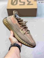 Beige and tan knit sneaker with a muted side stripe and gum-colored ribbed sole.