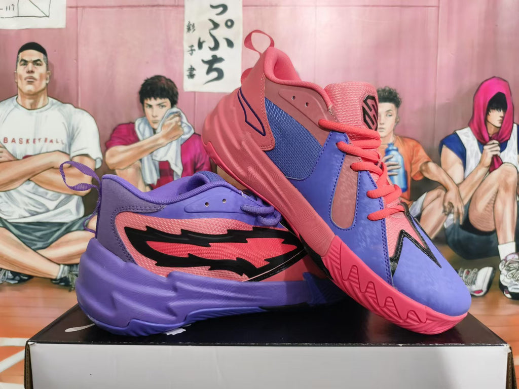 Angled view of pink and purple basketball sneakers showing the color-blocked uppers and sculpted soles