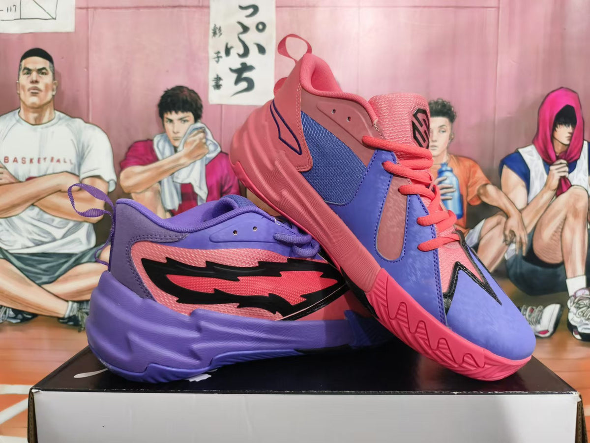 Angled view of pink and purple basketball sneakers showing the color-blocked uppers and sculpted soles