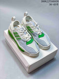 Pair of Y-3 Rivalry sneakers in white, green and light blue, shown from above