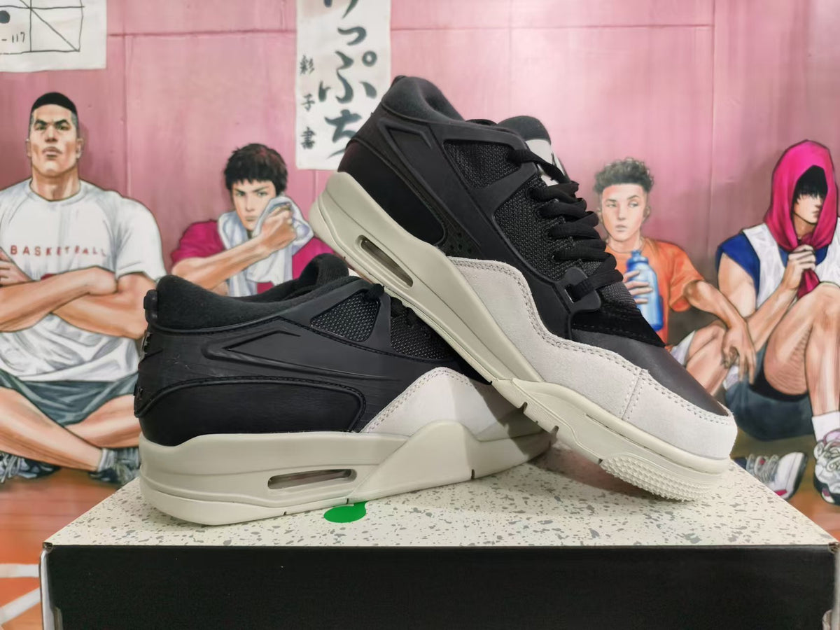 Pair of black and cream low-top sneakers shown from side and angled views
