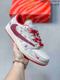 White and burgundy low-top sneaker with printed panels, burgundy accents, red laces, and a red outsole.