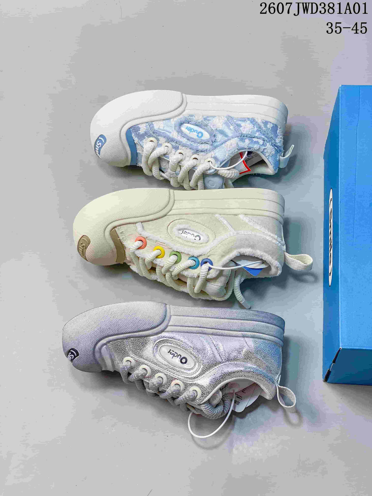 Side view of the three pictured Ouder sneaker color variations: blue-and-white, off-white, and silver.