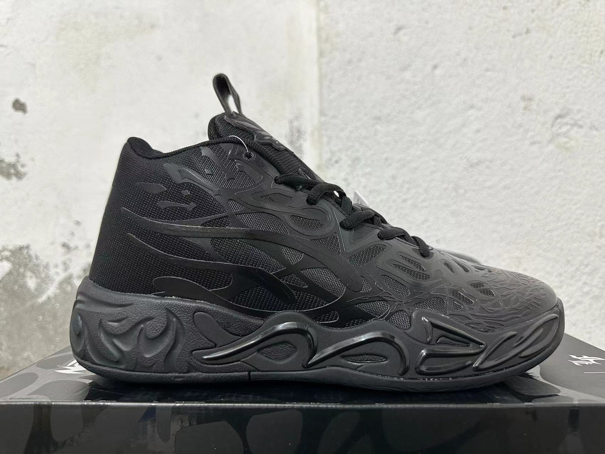 Side profile of a black high-top basketball shoe with graphic overlays and a sculpted sole.