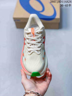 Top view of the cream sneaker showing white laces, padded tongue and orange ASICS tongue label; image text shows 2607JHD114A24 and 36–45 half sizes.