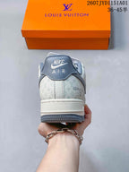 Rear view showing the gray heel tab and patterned upper