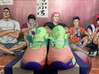 Front view of multicolor Jordan basketball shoes with pink toes and purple accents