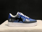Close side profile showing the glossy blue and gray upper, black star detail, and white Bape-branded sole.