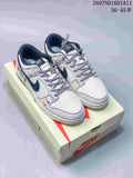 Pair of white and navy low-top sneakers displayed on a Nike shoe box, with style code 2607ND1601A11 and size range 36–45.5 visible above.