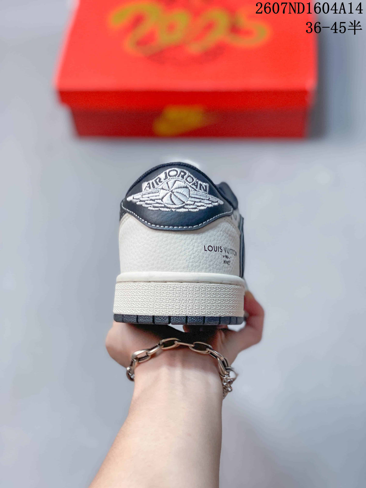 Rear view showing the white textured heel, navy collar, Air Jordan tongue detail, and Louis Vuitton branding.