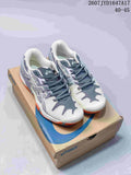 Pair of white, grey and orange ASICS GEL-RESOLUTION 5 tennis shoes displayed on an ASICS shoe box; style code 2607JYD1647A17 and size range 40–45 are visible.