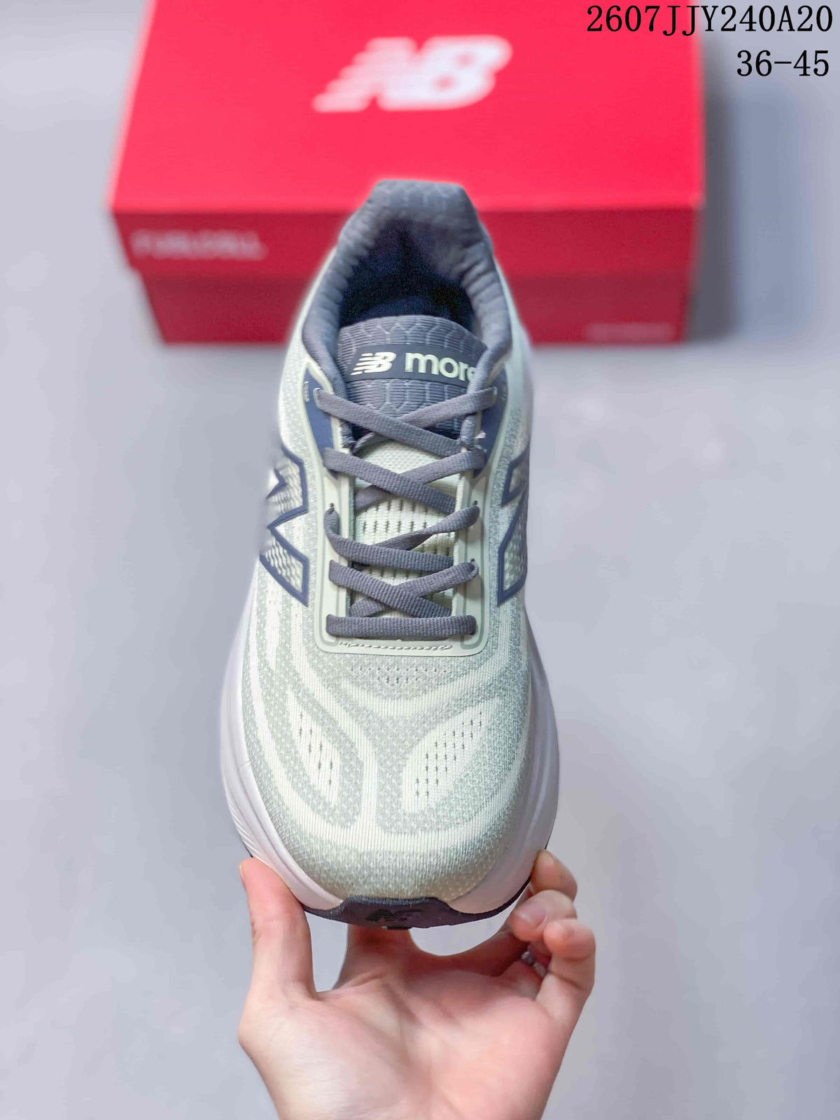 Top view showing the mesh-style upper, gray laces, and New Balance tongue branding.