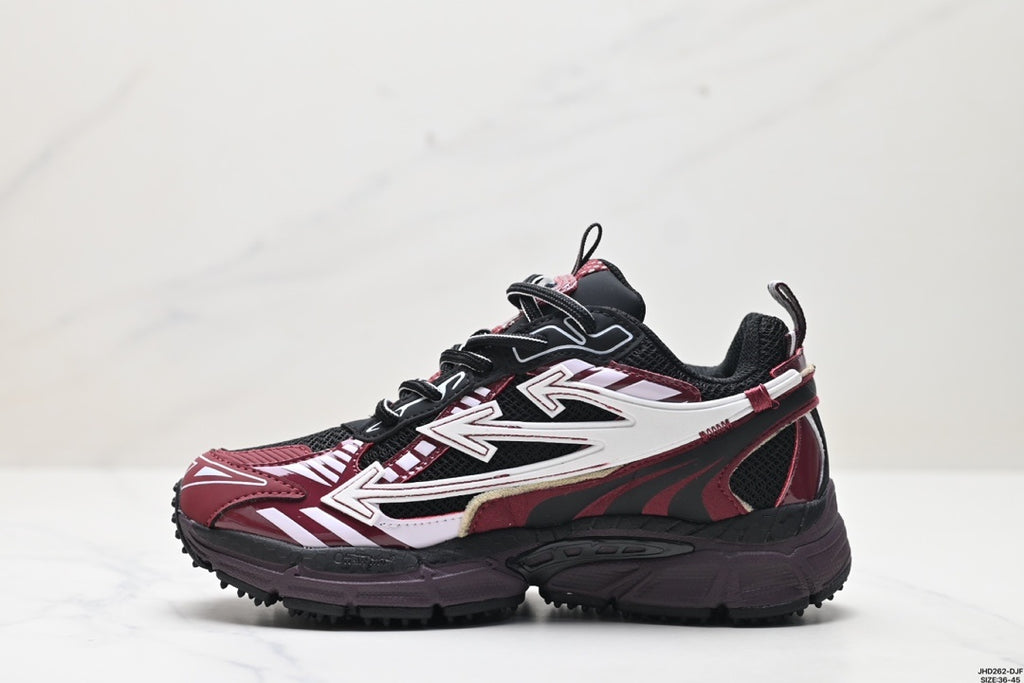 Single sneaker in side profile showing the rounded toe, lace-up construction, layered side graphics, and rugged outsole.