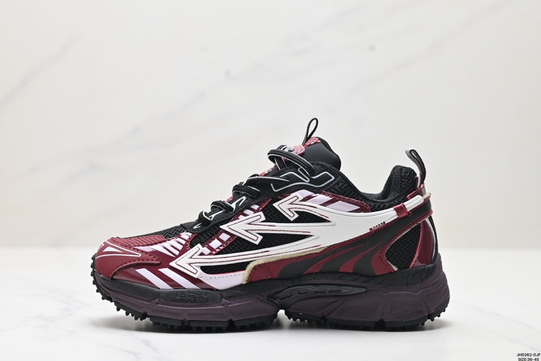 Single sneaker in side profile showing the rounded toe, lace-up construction, layered side graphics, and rugged outsole.