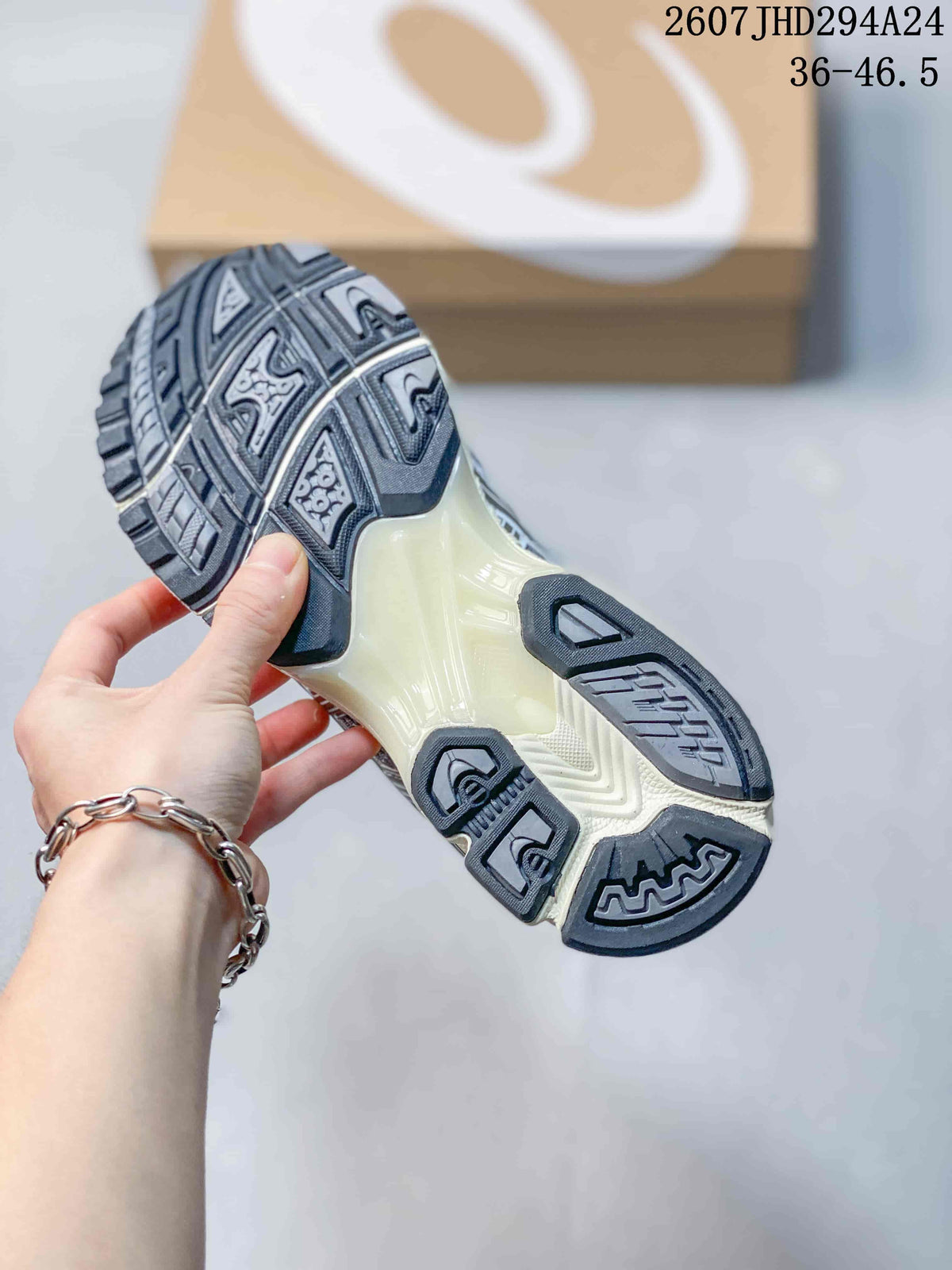Underside view of the sneaker showing a dark patterned rubber outsole and a translucent blue-gray midfoot section; image text shows style code 2607JHD294A24 and size range 36–46.5.
