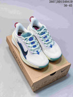 Pair of white Nike Zoom Fly 5 sneakers with blue and teal accents displayed on a Nike shoebox.