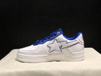 Side profile showing the white low-top silhouette, large outlined star detail, blue collar, and layered outsole.