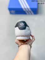Rear view showing the padded heel and adidas trefoil branding on the black heel tab.