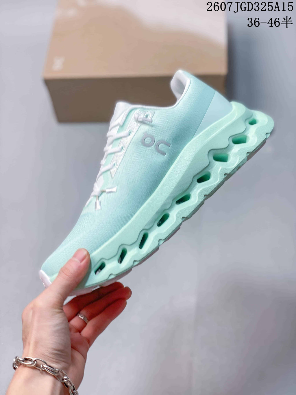 Side profile of the mint green On Cloudtilt sneaker showing the lace-up upper and open-channel midsole design.