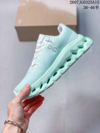 Side profile of the mint green On Cloudtilt sneaker showing the lace-up upper and open-channel midsole design.