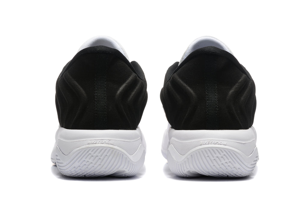 Rear view showing the black heel panels and white outsole of the shoes