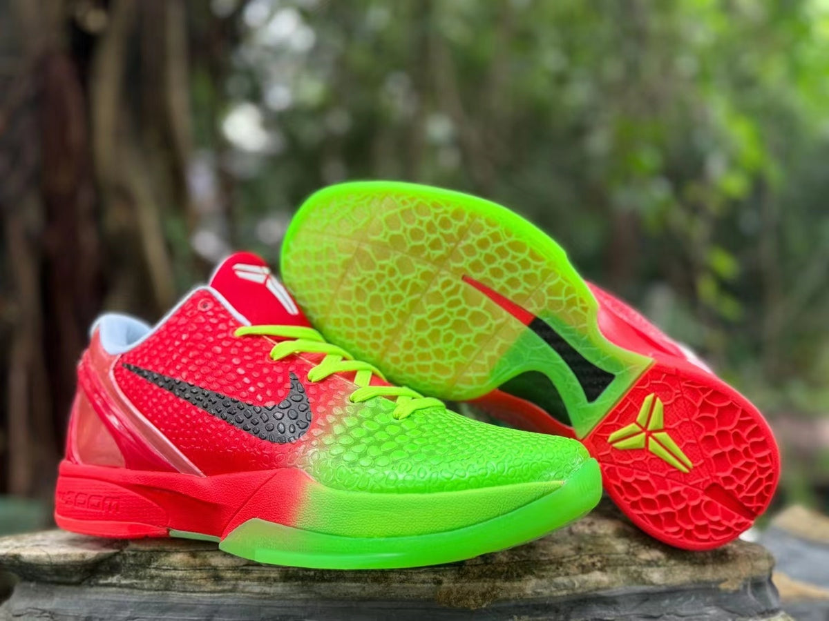 Outsole and side details of the red and green basketball shoes