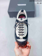 Top view of the trainer showing the contrasting tongue, textured laces and rounded toe.