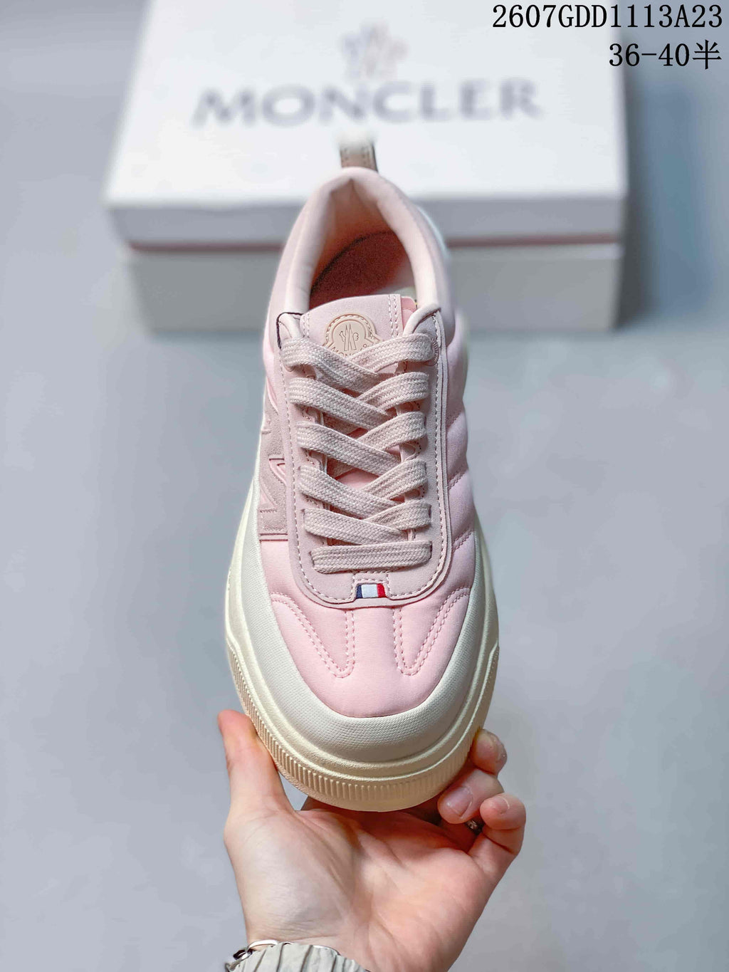 Top view of the sneaker showing the lace-up front, padded collar and decorative tongue detail.