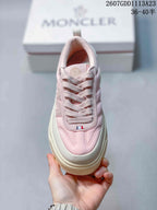 Top view of the sneaker showing the lace-up front, padded collar and decorative tongue detail.
