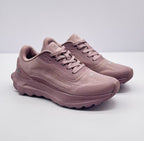 Pair of pink alo sneakers shown from a front three-quarter angle.