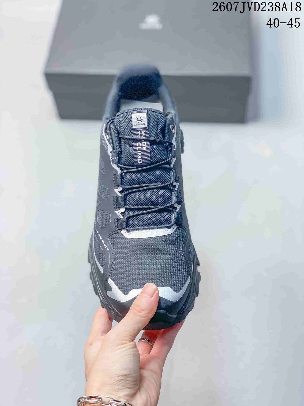 Top view of the shoe showing the mesh-style forefoot, padded tongue, lace system, and contrasting toe accents.