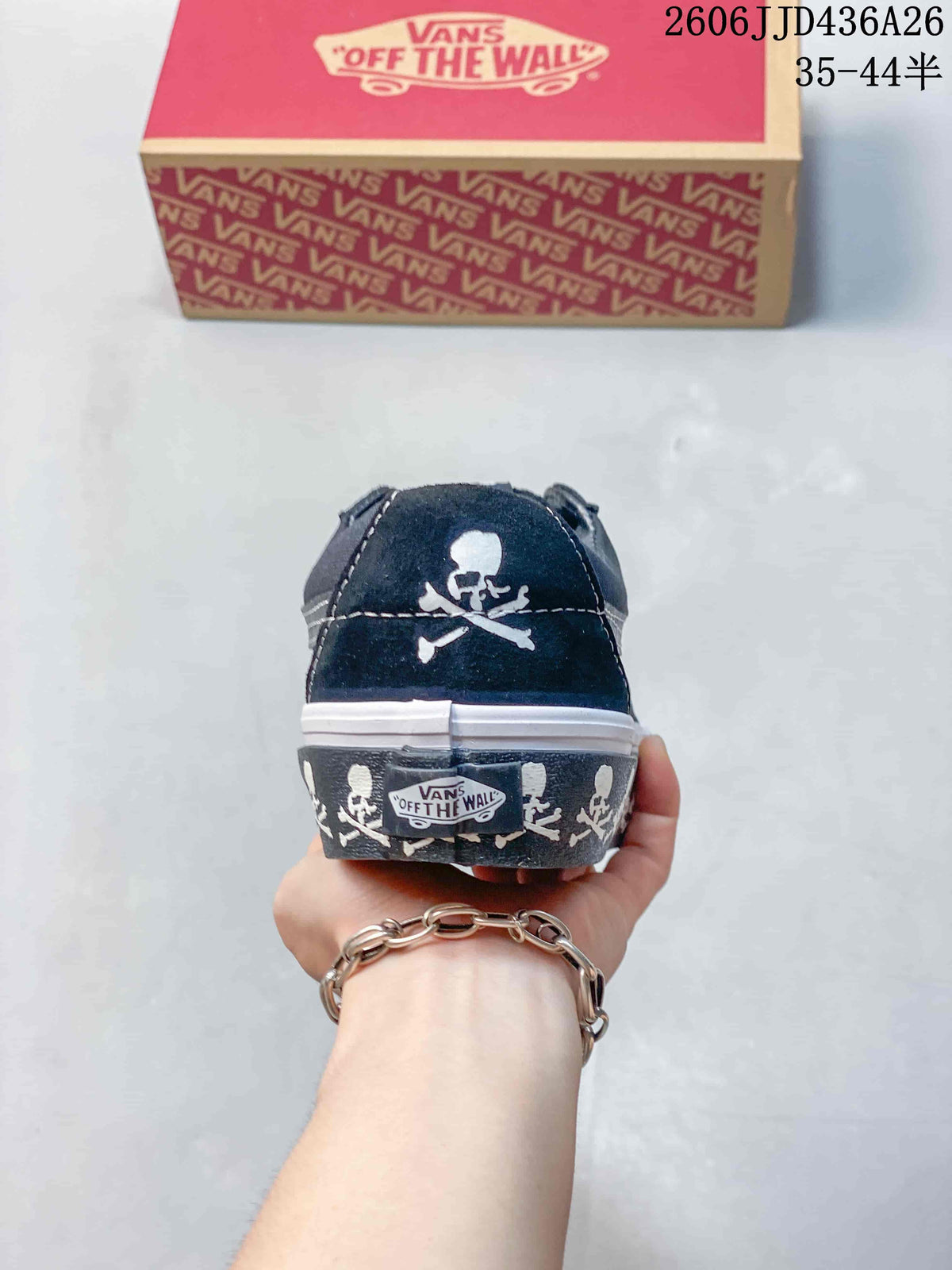 Rear view showing the white skull graphic on the black heel and skull detailing around the foxing.