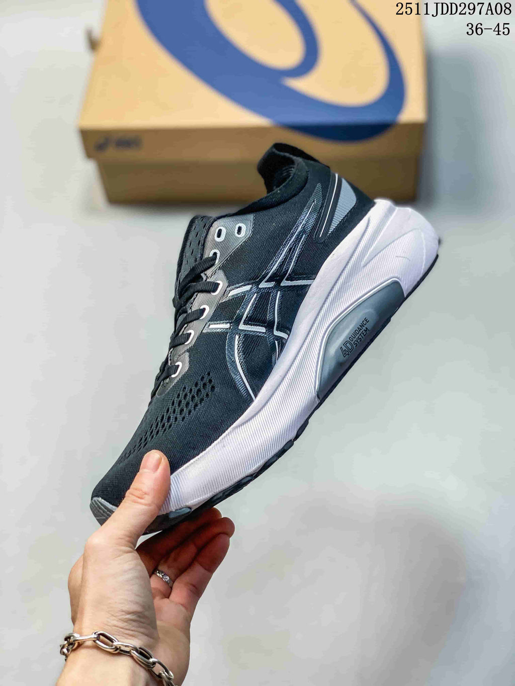 Side profile of the black and navy lace-up sneaker showing the Asics logo, white midsole, and segmented outsole.