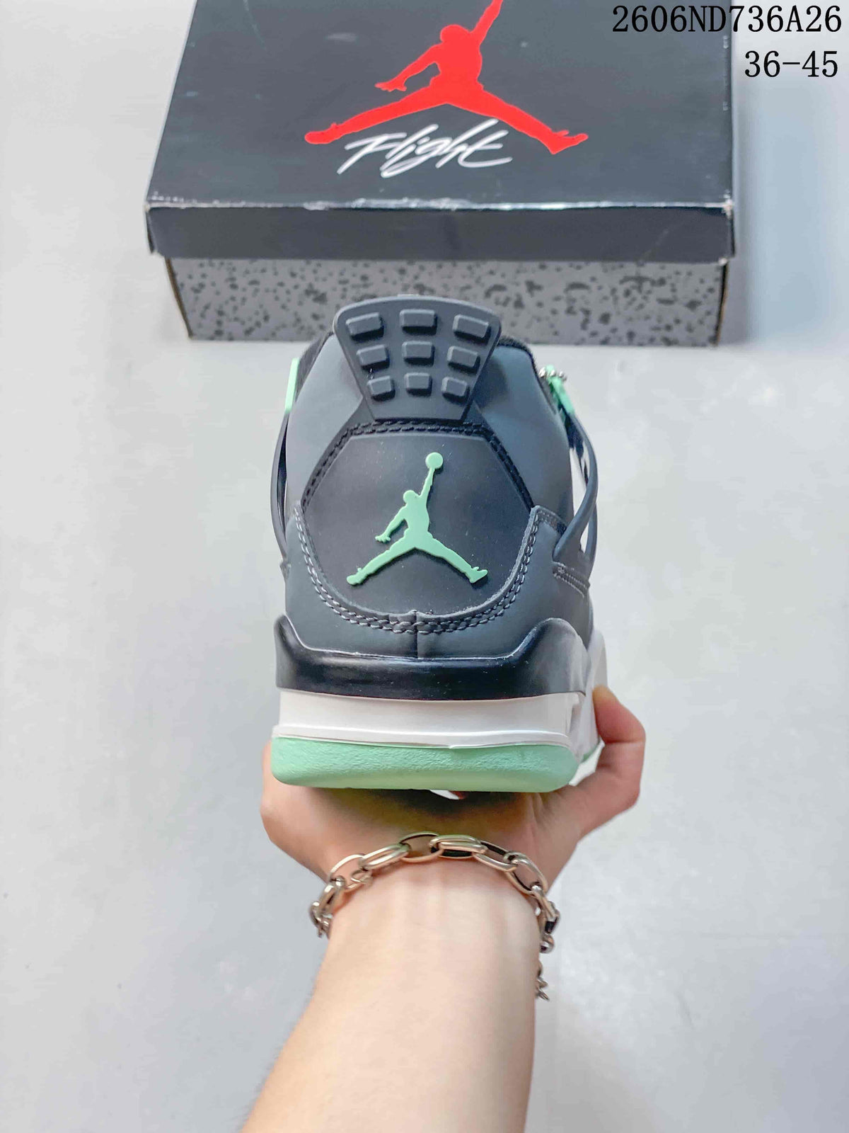 Rear view showing the dark heel panel, mint Jumpman mark, and layered midsole.