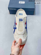 Top view of the cream sabot sneaker showing the covered toe, open-pattern upper, and tongue branding.