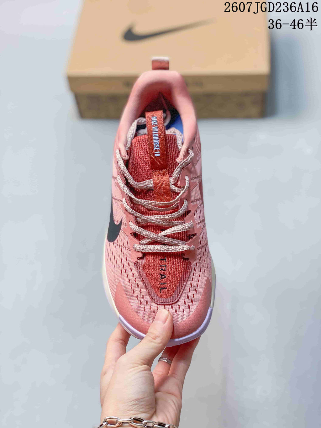 Top view showing the lace-up construction, textured upper and tongue labels reading Wildhorse 10 and Trail.
