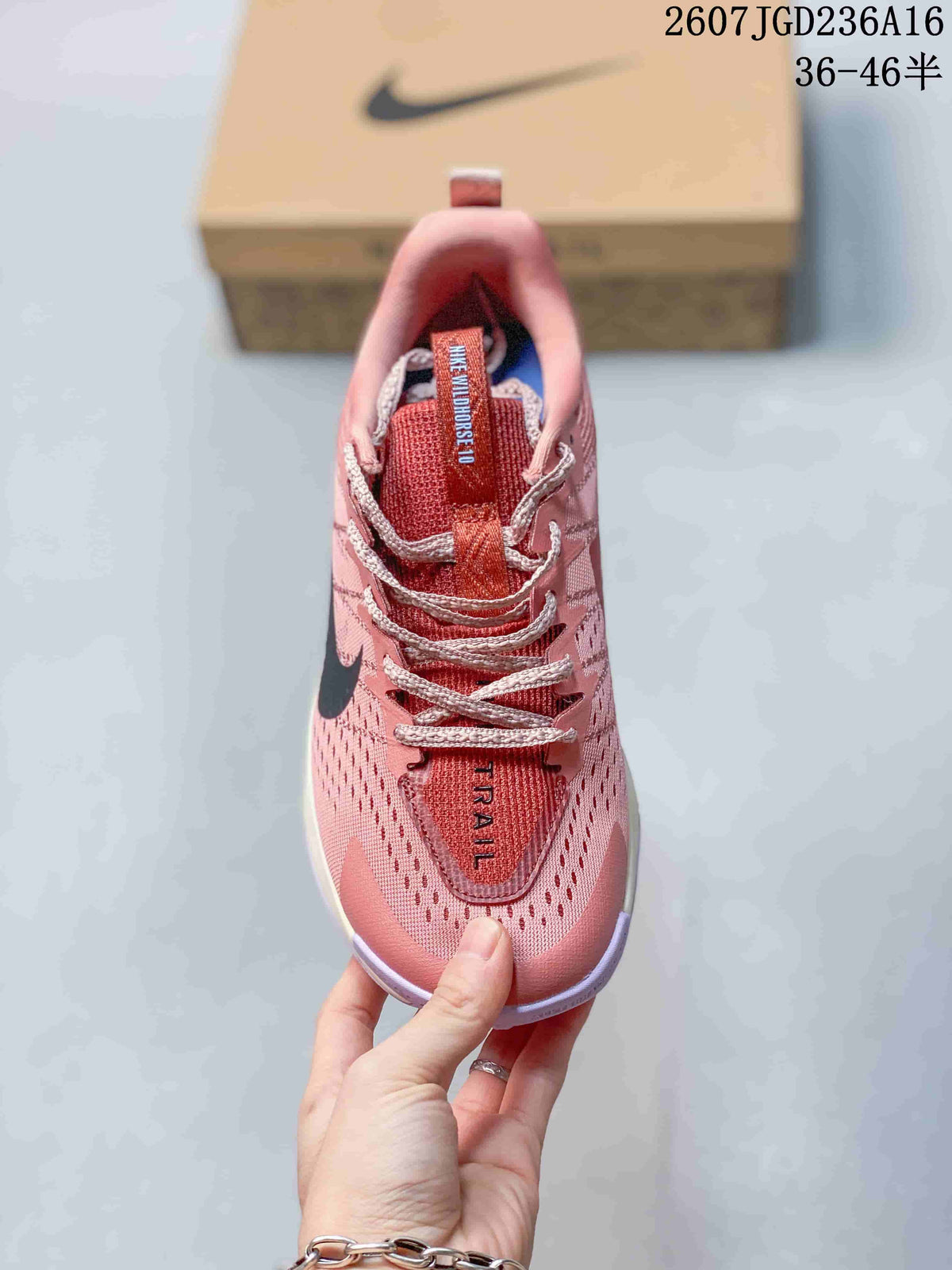 Top view showing the lace-up construction, textured upper and tongue labels reading Wildhorse 10 and Trail.