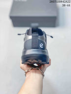 Rear view of the dark gray ECCO sneaker showing the heel pull tab, layered heel construction, and outsole profile.