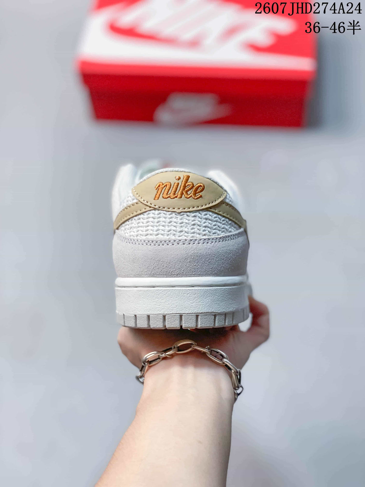 Rear view highlighting the padded heel area and light gold detailing.