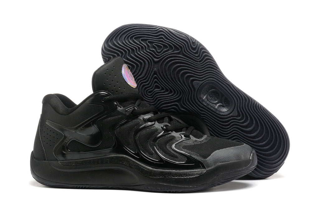 All-black Nike KD 17 basketball shoes with a patterned black outsole.