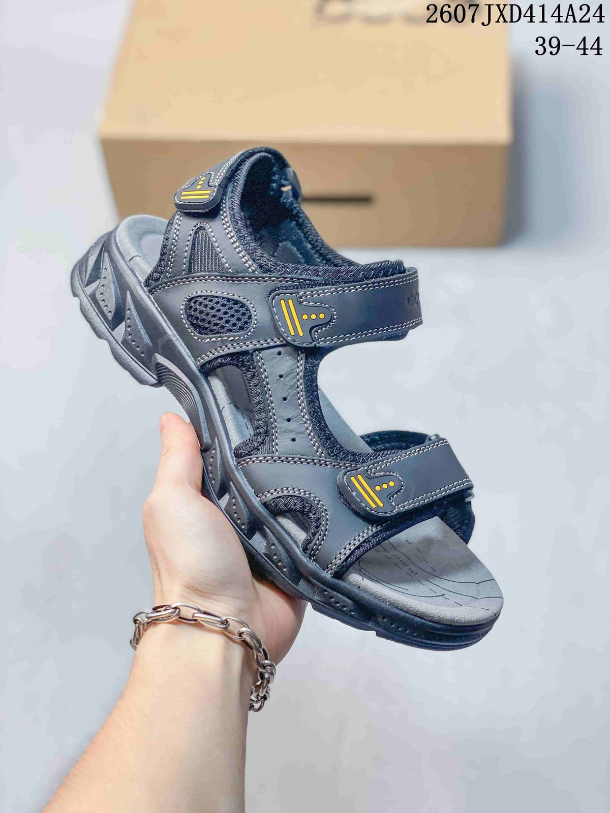 Angled front view of the dark black ECCO sandal showing the open toe, adjustable straps, contrasting stitching and treaded outsole.