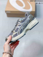 Side profile of the silver-gray sneaker showing mesh panels, metallic overlays, layered midsole construction, and a dark outsole; image text shows style code 2607JHD294A24 and size range 36–46.5.