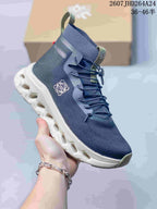 Angled side view of the navy high-top sneaker showing Loewe branding, On details, olive pull tabs, and the white outsole.
